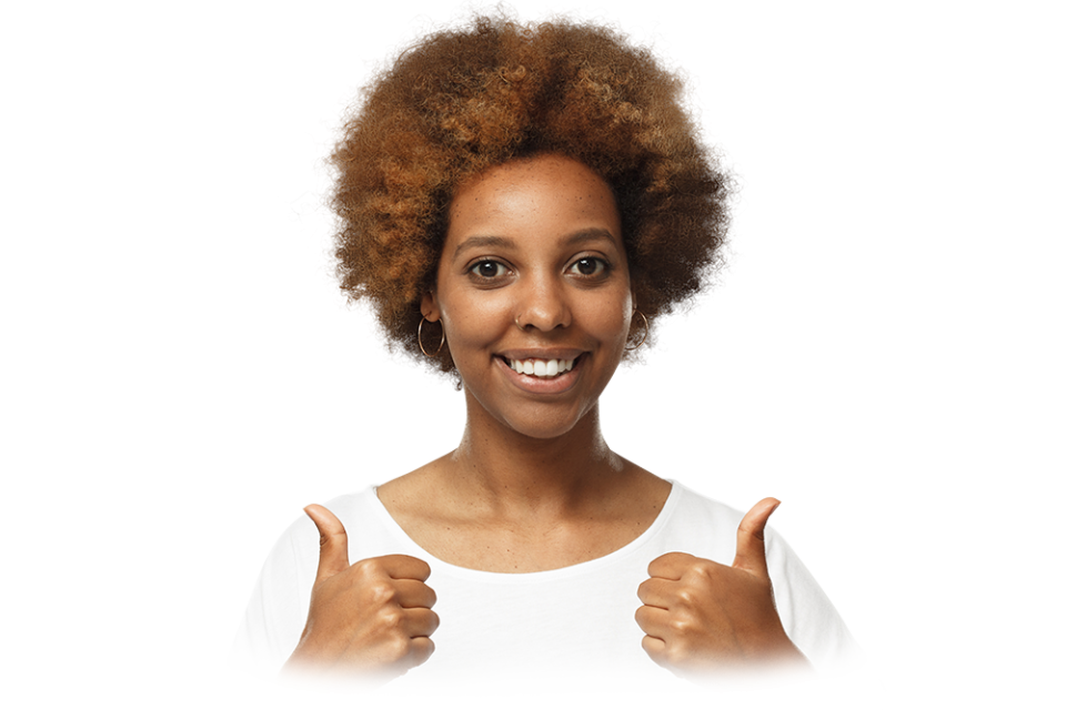 Photograph of a lady smiling and giving two thumbs up.